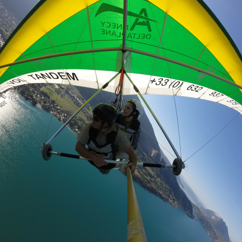 high performance hang gliding flight above lake Annecy
