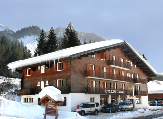 Hôtel Eliova l'Eau Vive sous la neige à Châtel l'hiver au Linga