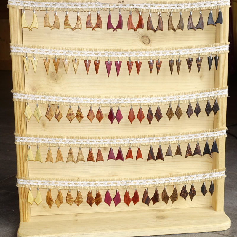 Earring in exotic wood display